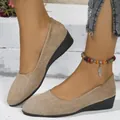 Close-up of women's khaki suede pointed toe wedge loafers on feet - 36 / Pointed Toe Wedge Loafers / Khaki Solid