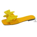 Stylish vibrant yellow flat slide sandals for women featuring a large decorative fabric bow - 35 / Yellow