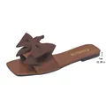 Elegant brown flat sandal featuring a large decorative bow and a comfortable 1cm low heel. - Brown