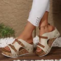 Side view detail of beige platform wedge sandals featuring brown buckle straps and rivets - 36 / Off White