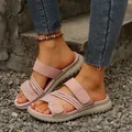 Close-up of pink flat sandals for women with hollow-out straps and non-slip sole - Pink