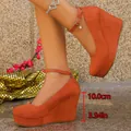 Elegant orange suede wedge platform shoes featuring a 10cm heel and stylish ankle strap - 36 / Orange Red