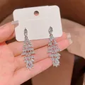 Exaggerated retro silver tassel drop earrings featuring elegant marquise crystal leaves - Marquise Rhinestone Long Tassel Style (A2805)