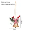Goldene Weihnachtsglocke aus Eisen mit roter Schleife und Beeren zum Aufhängen 8,8 cm - Goldene Trompetenglocke