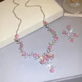 Elegant pink floral vine jewelry set featuring sparkling rhinestones for bridal wedding attire. - Earrings Necklace Set / Pink