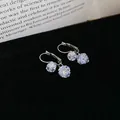 Macro detail of sparkling faceted zirconia pendant earrings on black velvet - Double Layer Geometric Zircon Dangle (2#) / Silver