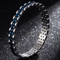 Macro view of two-tone silver and blue titanium steel watch-style link bracelet - Silver Blue