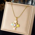 Detailed view of a vintage baroque gold cross necklace featuring vibrant colorful cabochons. - French Vintage Multicolor Cross Pendant (N4590)