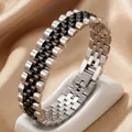 Vue détaillée d'un bracelet de montre en acier inoxydable à maillons noirs et argent - 12mm / Noir Argenté