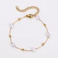 Elegantes, 18 Karat vergoldetes Edelstahlarmband mit herzförmigen Perlen und Goldperlen - Armband