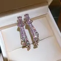 Gedetailleerde weergave van elegante roze zirkonia strik oorbellen met druppels - Strik Kwastje Waterdruppel (40#) / Set van 1 paar / Zilver