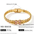 Detail view of gold stainless steel bracelet with pink teardrop zircons and measurements - Pink Teardrop Style (NB-B6658) / Inner Diameter 60mm / Gold