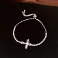 Detailed view of silver cross pendant bracelet with cubic zirconia and slider - Style 4 (HB7047) / Silver