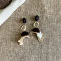Detailed macro view of ethnic wooden earrings with iridescent shell pendants. - 6# Irregular Shell Wood Patchwork (Coffee)