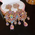 Elegante roze druppeloorbellen met sprankelende iriserende kristallen en goud SKU - Roze Goud Zwaar Ambacht Waterdruppel Stijl (47#) / Goud/Roze