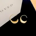 Minimalist brushed gold crescent earrings featuring a stylish curved hook design - Ear Hook - Gold