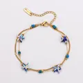 Detail view of double-layer stainless steel bracelet with blue starfish and beads - Blue and White Starfish (Starfish Style 3) / 17+5cm