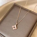 Elegant rose gold necklace with cat eye stone geometric rhombus pendant detail. - Necklace / Rose Gold