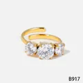 Elegante gouden roestvrijstalen ring met drie 5A sprankelende zirconi - Verstelbare Open Stijl (B917) / Goud
