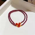 New Chinese style garnet beaded bracelet with carnelian accents and gold spacers - Three Agate Main Beads Style / Gold-Red