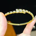 Macro view of a luxury 18K gold plated buckle bangle featuring intricate zircon stone details - Long Block Micro-Inlaid Style (5#) / Gold