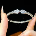Detail of 18K gold-plated geometric bangle with sparkling pavé zircons - Zigzag Geometric Style (4#)