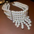 Girocollo di perle a più fili elegante con pendente a frange e strass - Collana Pendente con Nappine di Perle a Quattro Strati (60#) / Argento-Bianco