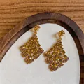 Élégantes boucles d'oreilles pendantes éventail dorées avec cristaux ambre style vintage - Brun doré