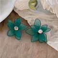 Elegant dark green fabric flower stud earrings with central zircon and silver pins. - Green