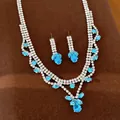 Elegantes Schmuckset bestehend aus Halskette und Ohrringen mit blauen Zirkonia-Wassertropfen - Zweiteiliges Set / Silber-Blau
