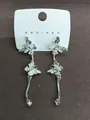 Boucles d'oreilles papillon argentées élégantes avec glands brillants et strass - Argent