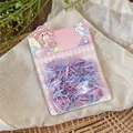 Detail shot of colorful disposable elastic hair bands in cute pink cartoon packaging - 400 Pieces/Pack / Purple-Pink