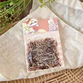 Package view of brown and beige disposable elastic hair ties in cute cartoon packaging - 400 Pieces/Pack / Brown