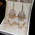 Ornate gold tassel earrings with peach crystals and pearls displayed in a white luxury box - 48# Champagne Gradient Zirconia Tassel Style / Hook Style / Gold