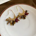 Vintage gold hoop earrings featuring multi-color stone tassels and tiger eye beads for women - Colorful Bead Vintage Tassel Earrings / 58# Gold-Brown