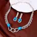 Elegant silver-tone jewelry set with oval blue stones and clear rhinestones for banquets - Necklace And Earrings / Silver-Blue
