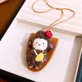 Handmade plush doll pendant necklace with leather holder and cord decoration - Brown
