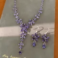 Close-up view of elegant purple zircon flower and teardrop jewelry set for women - Necklace And Earrings Two-Piece Set / Necklace-Purple