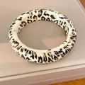 Stylish round resin bangle featuring a classic leopard print pattern for women - Coffee-Black