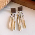 Close-up of vintage square wood earrings with pearl and gold glitter shell tassels. - Coffee-White (1#)