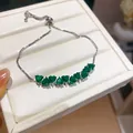 Detailed view of silver adjustable bracelet featuring sparkling green heart-shaped zircons - Silver Green Heart Style (7#)
