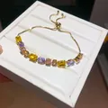 Detailed macro view of 18k gold plated bracelet featuring colorful geometric cubic zirconia - Geometric Splicing Style (10#)