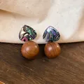 Detailed view of retro heart-shaped marbled earrings featuring polished wooden beads - Colorful Heart Patchwork Wood Bead Style (17#) / Coffee-Green (17#)