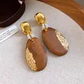 Detailed macro view of vintage wooden earrings featuring gold foil accents and elegant pearl beads - Gold Foil Geometric Patchwork Style (Silver Earring Post)(23#) / Gold and Coffee