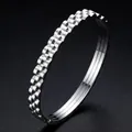 Elegante roestvrijstalen drielaagse tandwielarmring voor dames in zilver - Zilver