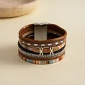 Macro detail of Bohemian multi-layer leather bracelet with rhinestones and magnetic clasp - Dark Coffee