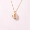 Elegant gold locket necklace featuring a pink ice cream enamel charm on white background - Pink Conch