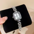 Luxury silver women's quartz watch with rhinestone-encrusted cushion case and chain strap - Cushion Case Style