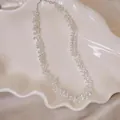 Elegante Choker-Halskette mit klaren Zirkonperlen und silberfarbener Kette Schmuck - Zirkonia Perlen Stil / Silber