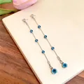 Elegante silberne Quastenohrringe mit blauen Perlen und Zirkonia im minimalistischen Stil - Lange Quasten Ohrstecker (HE35674) / Silber-Blau